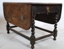 A large and wide 1920`s good oak refectory barley twist drop leaf dining table. Single drawer to