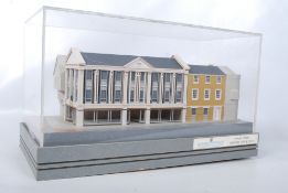 An architects model of a new development entitled 11 High Street, showing a new Clarks Shoes