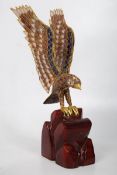 Cloisonne style Chinese bird of prey on plinth. 25cm tall.