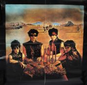 Music Memorabilia. An unframed Motley Crue ? music album poster. Overall 59cms High x 59cms Wide.