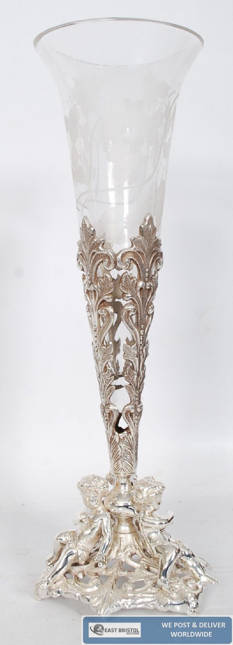 A silver plated trumpet vase