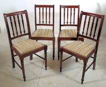 A set of 4 mahogany regency style dining chairs. Turned legs united by stretchers having drop in