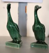 A pair of Chinese porcelain ducks in glazed green together with a pair of fowls (af)