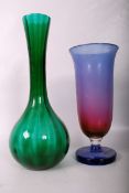 A large  irridescent studio glass stem vase together with a large bulbous green vase. 51cms & 40cms