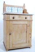 A Victorian pine and marble top side cabinet / washstand. Single door enclosing storage beneath a