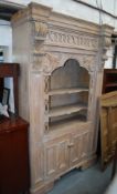 A very large Victorian large pine library bookcase cabinet in the adams revival style. Double door