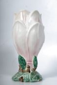 A good 1930's Clarice Cliff style flower vase. The decorative stem base having petal sides unfolding