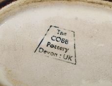A collection of studio pottery to include the cobb pottery devon along with others. 17cm tallest.
