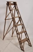 A 20th century wooden step ladder, with slatted construction. 170cm tall (unfolded)