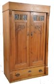 An early 20th century french provincial pine armoire / wardrobe. Single drawer to base having twin