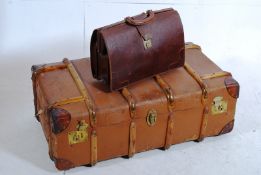 An early 20th century large canvas bound steamer trunk (ideal as a coffee table) together with a