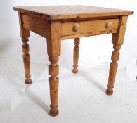 A Victorian country pine games / chess table. The turned legs supporting a square table top having