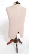 A good 20th century mahogany plaster / papier mache tailors dummy / manequin. Splated legs with