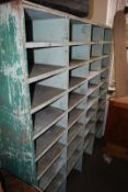 A large 20th century Industrial shabby chic painted pigeon hole / stationary cabinet. The square