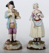 Two Meissen style figurines, with crossed sword marks to base. One AF. 21cm tall.