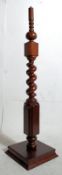 A Victorian barley twist mahogany standard lamp base. 141cm tall.