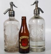 An early 20th century Bristol soda syphon by CE Beavis together with a French syphon by Stravers &