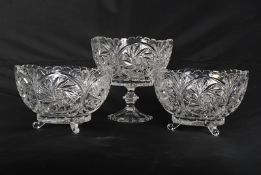 A Yugoslavian three piece cut glass garniture bowl set.