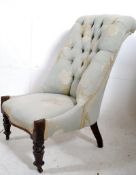 A Victorian ladies mahogany armchair. The turned legs on castors supporting an open frame newly