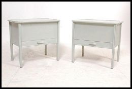 2 1950's shabby chic French painted bedside table cabinets. Both with lined interiors under hinged