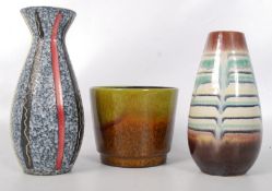 A West German earthen planter along with a West German studio pottery vase (20cm) and one other