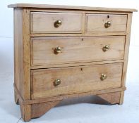 A Victorian 2 over 2 country pine chest of drawers. Pine dovetailed drawers with brass knobs to