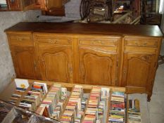 A large french provincial oak sideboard / dresser base.  Fitted three drawers over three