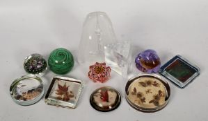 11 glass paperweights to include Murano, Cathness etc.