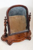 A Victorian mahogany toilet swing mirror. The spiral twist columns supporting a good sized mirror.
