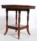 A Victorian mahogany octagonal centre table / hall table. The block and turned legs supporting solid