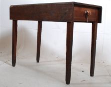 A 19th century Georgian oak pembroke / dining table. The squared supports having drop leaves to
