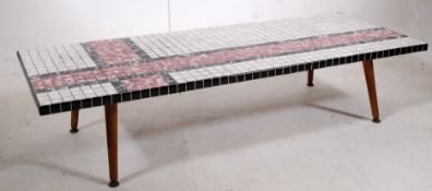 A 1960's original retro tile top mosaic rectangular coffee / occasional table. The decorative design