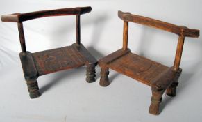 A pair of West African hardwood tribal hand carved low chairs, one with the seat depicting a zebra