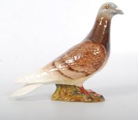 A good Beswick Hen Pigeon figurine model no 1383. Marked to base. 14cms High x 16cms Length