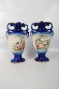 A pair of blue and white KLM Staffordshire transfer print vases. 35cm tall each.