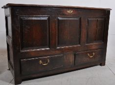 A Georgian 18th century country oak mule chest / coffer. The stile legs supporting a wide body