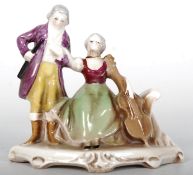 1930's William Goebel small figurine group of a courting couple. Backstamp dating to 1923-1949.