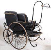 A 19th century Victorian coachbuilt perambulator / pram with black leather construction and large