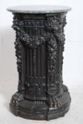 A cast metal and marble top neo classical pedestal. Circular base with decorative reeded sides