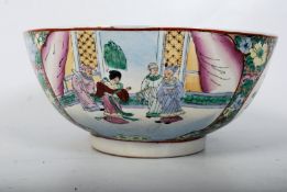 A 20th century Chinese hand painted floral famille rose china fruit bowl. The decorative floral