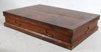 A Georgian 19th century oak campaign plan chest trunk. The plinth banded base having exterior
