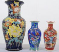 A decorative Chinese famille bleu vase 31cms high together with a decorative Japanese vase 31cms