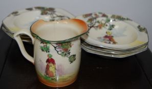 A Royal Doulton 'Old English Scene' cream pourer and six dessert bowls.