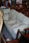 A good quality Lebus leather 3 piece  sofa  settee and and armchairs in seamist. Mahogany plinth
