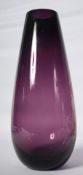 A Royal Doulton hand made purple glass pear drop vase. 29.5cm.