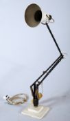 A Herbert Terry anglepoise lamp, in a cream colour