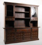 A very large oak continental dresser sideboard cabinet of continental style having a series of
