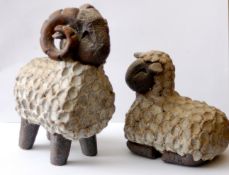 A pair of original ceramic figures by Sarah D'arcy.  Small Ram Standing 7" HIgh 1.0kg /  Small Ewe