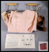 A 1950's Rallie massage / health belt in original stamped box complete with instructions. From