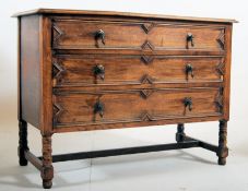 1930's Jacobean revival oak chest of drawers. The spiral twist legs with castors supporting a low